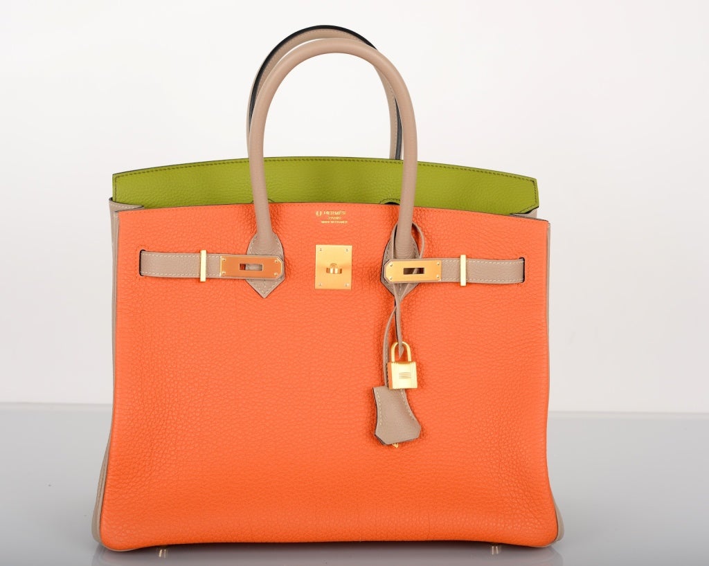 SPECIAL ORDER HERMES BIRKIN BAG 35CM ORANGE | GRIS | VERT ANIS | BRUSHED GOLD HW

AS ALWAYS..ANOTHER ONE OF MY INCREDIBLE FINDS. 

THIS SPECIAL BAG WAS ORDERED FOR MY CLIENT.

GORGEOUS 35cm TRI COLOR ORANGE, VERT ANIS & GRIS TOURTORELLE TOGO