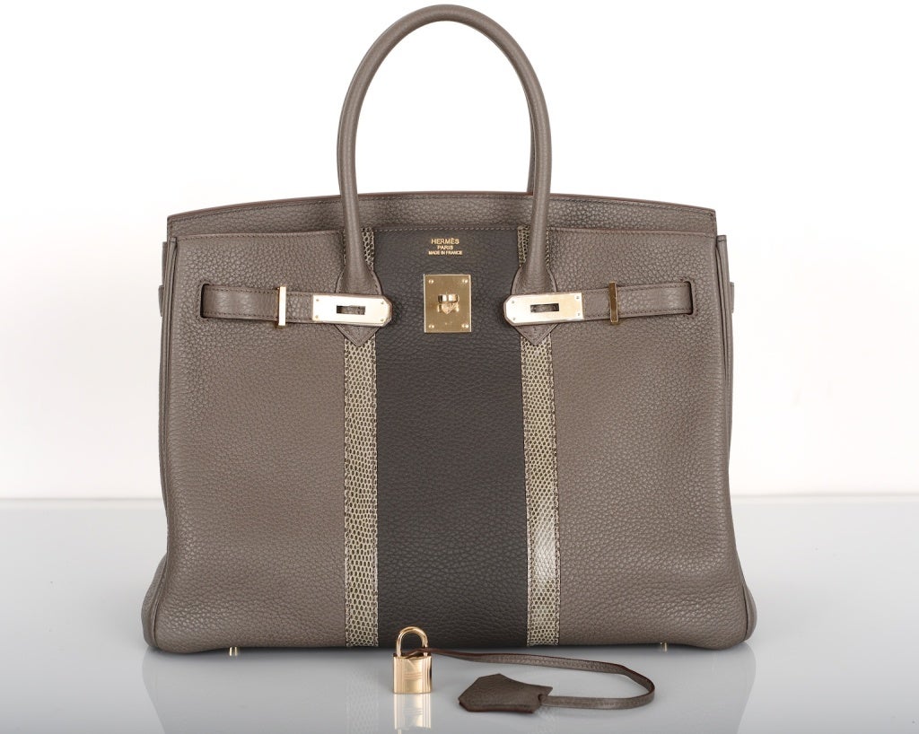 As always, another one of my fab finds, Hermes 35cm Birkin in the most stunning TRI COLOR COMBINATION ETAIN CLUB with  GRAPHITE in the MIDDLE & a gorgeous LIZARD STRIPE. THIS BAG IS BREATHTAKING THE GOLD HARDWARE MAKES THE GREY POP! BE THE ONLY