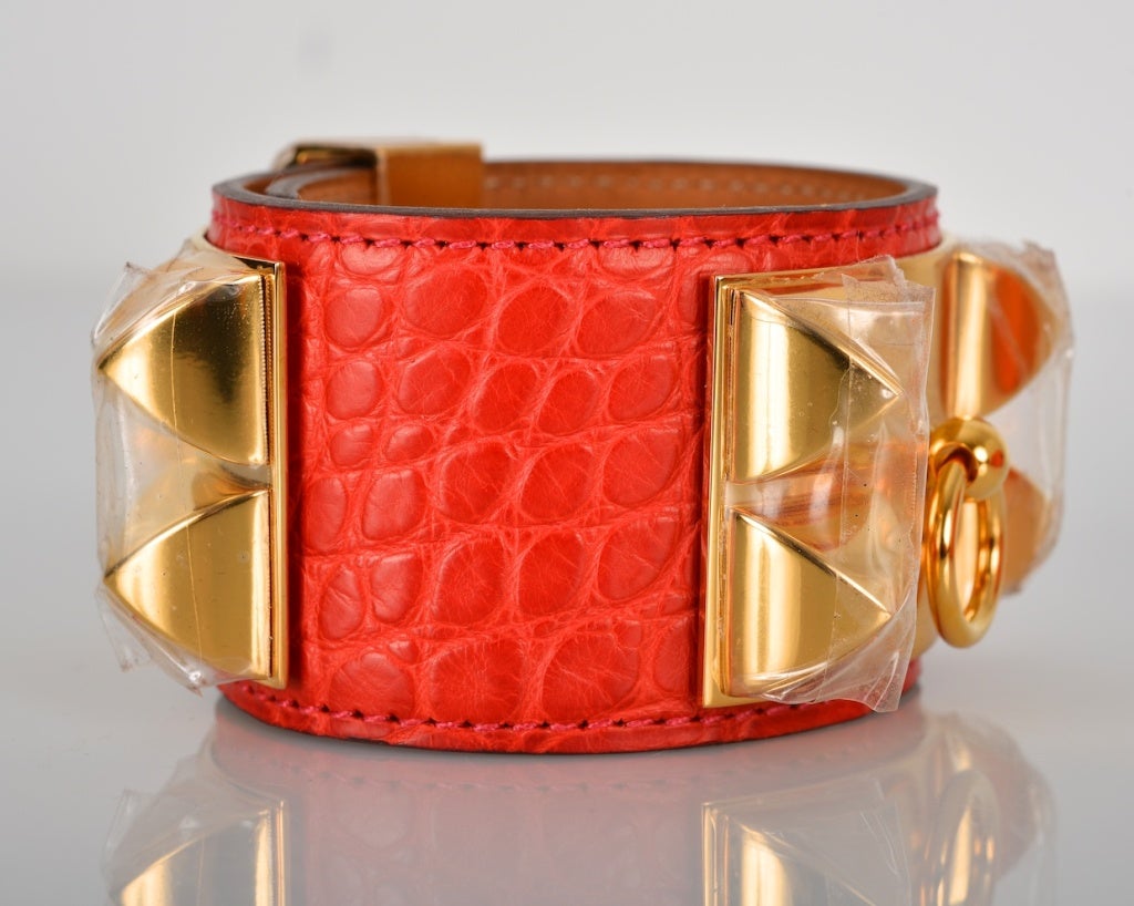 As always, another one of my fab finds, Hermes GERANIUM MATTE ALLIGATOR CDC Collier de Chien With GOLD hardware. Gorgeous new red color unusual matte gator. Absolutely brand new with a beautiful velvet pouch, cites and box.
**Note:

PROPERTY