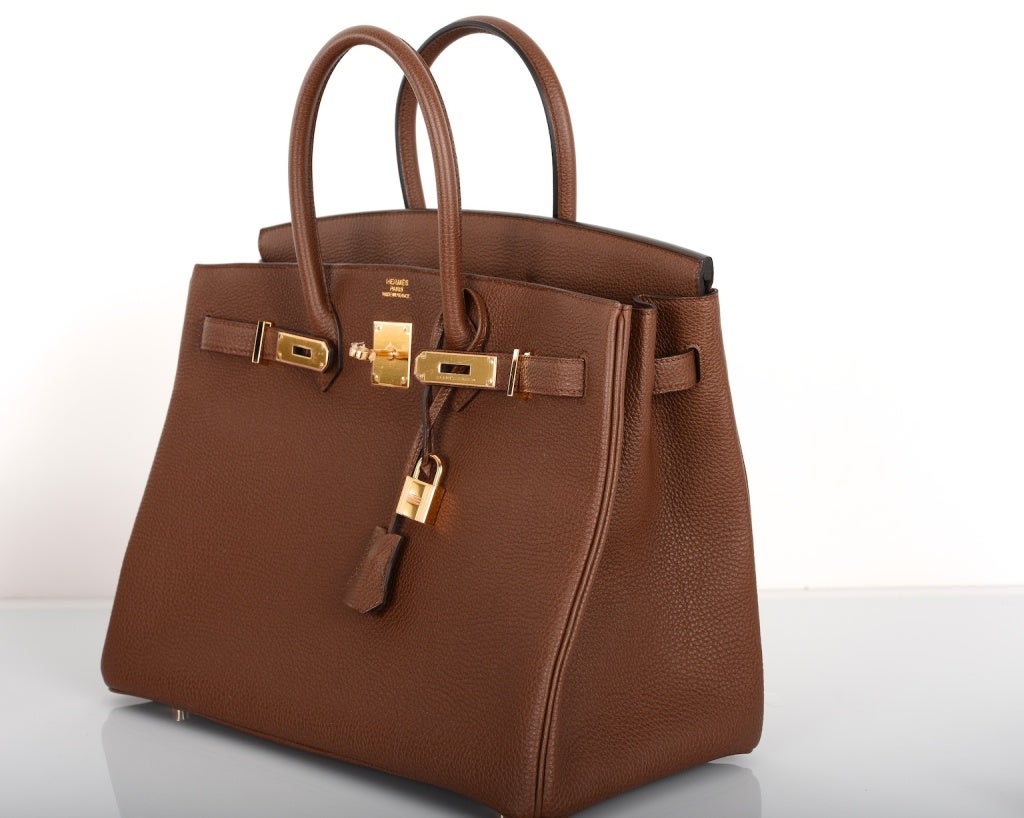 DELISH HERMES BIRKIN BAG 35CM BRULEE CHOCOLATE 35CM GOLD HARDWARE

As always, another one of my fab finds, NEW INCREDIBLE Hermes BIRKIN BAG 35cm BRULEE WITH GORGEOUS GOLD Hardware in beautiful TOGO leather. This bag is brand new with original box