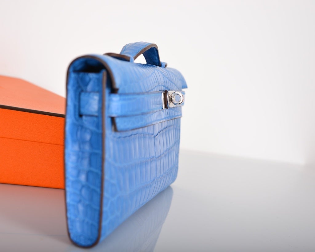 HERMES KELLY CUT MYKONOS MATTE CROCODILE BAG KELLY CUT CLUTCH POCHETTE

As always, another one of my fab finds, CANT GET THIS.. Hermes KELLY CUT IN THE MOST AMAZING MATTE  MYKONOS CROC THE BRIGHTEST BLUE EVER! NILO CROCODILE with PALLADIUM