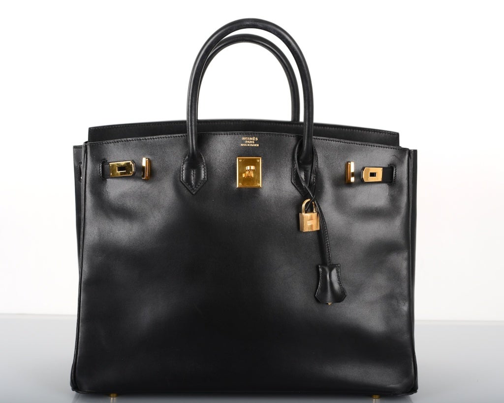 AS ALWAYS, ANOTHER ONE OF MY FAB FINDS, THE ONE... THE ORIGINAL BIRKIN BAG CREATED FOR JANE BIRKIN!  HERMES 40CM  BLACK BOX LEATHER WITH GOLD HARDWARE. THIS BAG IS FOREVER. 
THE MORE YOU USE IT THE BETTER IT LOOKS.
THE COLLECTORS KNOW JUST HOW