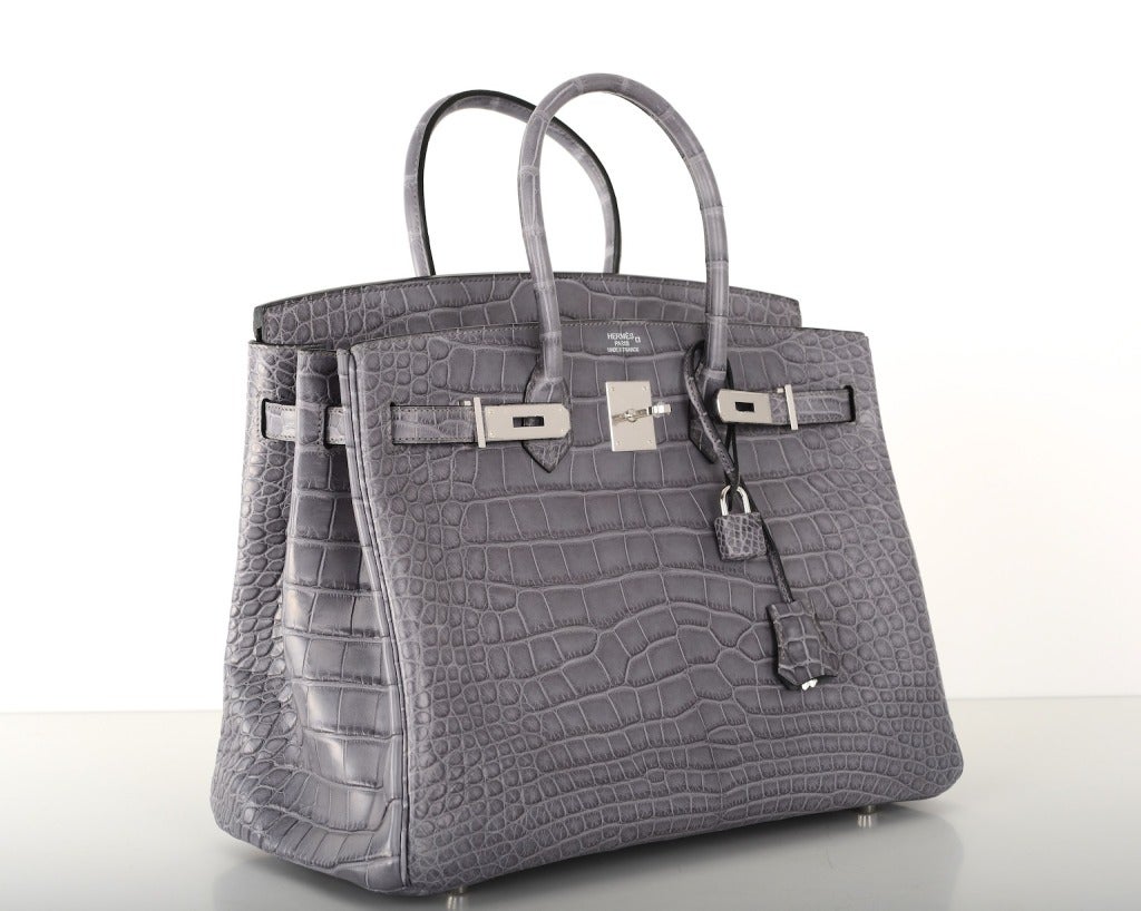 HELLO GORGEOUS!

HERMES BIRKIN BAG 35CM GRIS PARIS (GREY) MATTE CROC ALLIGATOR PHW!

AS ALWAYS, ANOTHER ONE OF MY FAB FINDS, THE SEXIEST BAG EVERÃ?¢?Ã?¦ HERMES 35CM BIRKIN IN MATTE GRIS PARIS ALLIGATOR. THIS IS THE MOST STUNNING BLUE GREY YOU