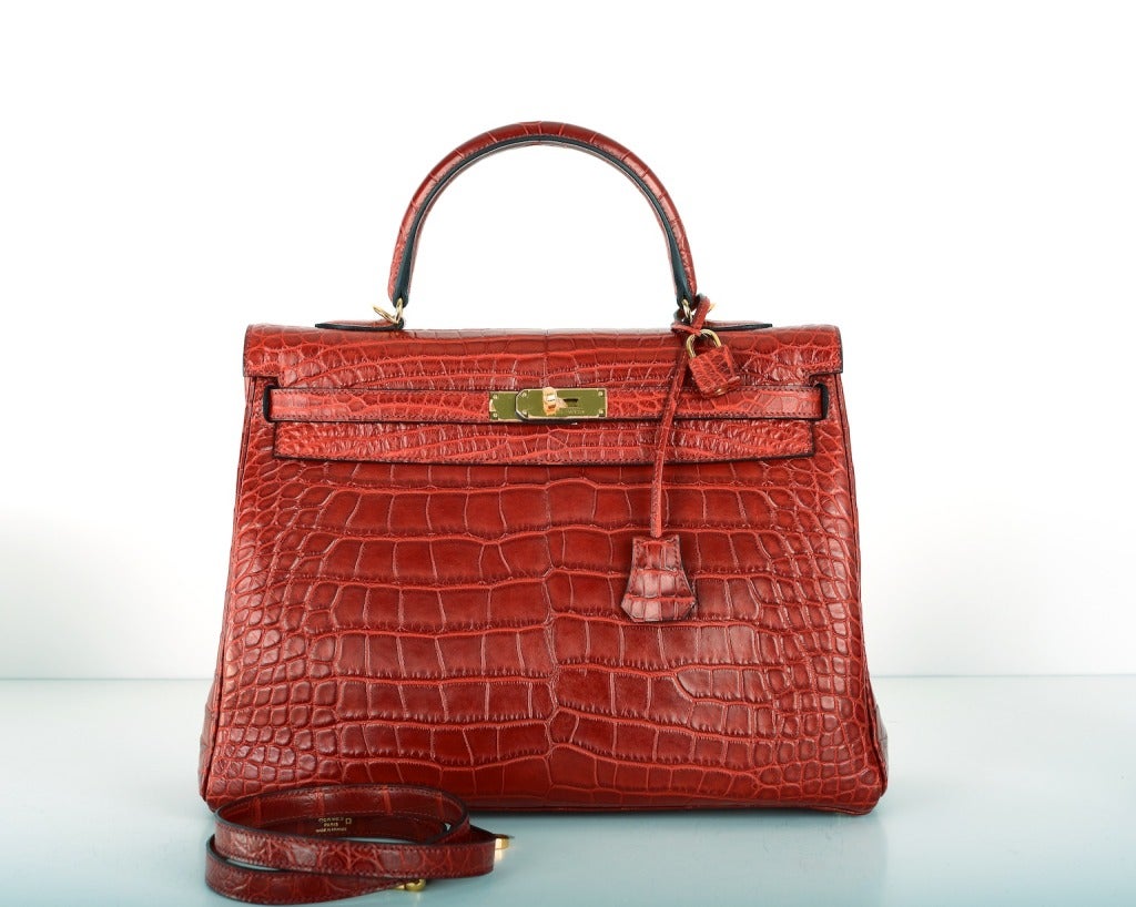 HERMES KELLY 35CM ROUGE H INSANITY MATTE ALLIGATOR CROCODILE

As always, another one of my fab finds, Hermes Kelly 35cm. The color is STUNNING ROUGE H, Perfection as always with GOLD hardware.

THIS BEAUTY IS BRAND NEW, NEVER WORN. THERE IS