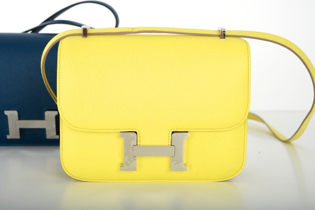 As Always, Another One Of My Fab Finds, Hermes Constance In A Perfect Size 18Cm!!! Very Rare Find In Soufre Yellow. Comfy Double Strap That Is Perfect To Carry Cross Body! Love Epsom Leather!

Measurements: 7.5"L X 5.5"H X