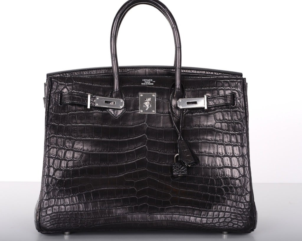 Hermes Birkin Bag 35Cm Black Matte Crocodile Phw Stunning! Hello Gorgeous! 

As always, another one of my fab finds, The sexiest bag ever… Hermes 35cm Birkin in beautiful MATTE black NILO crocodile with stunning palladium hardware.

• This bag