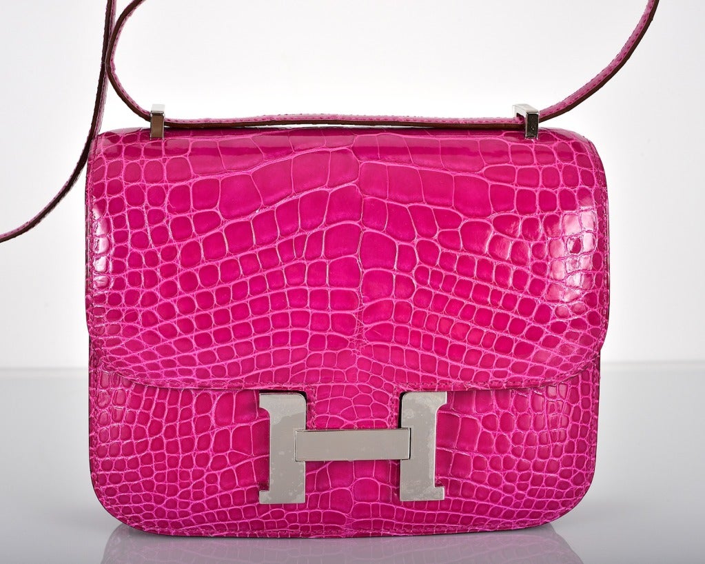 As always, another one of my fab finds! Hermes Constance in ALLIGATOR  a PERFECT size 18cm!!! Very rare FIND in the new ROSE SCHEHERAZADE color. Comfy double strap that is perfect to carry cross body!

Incredible 