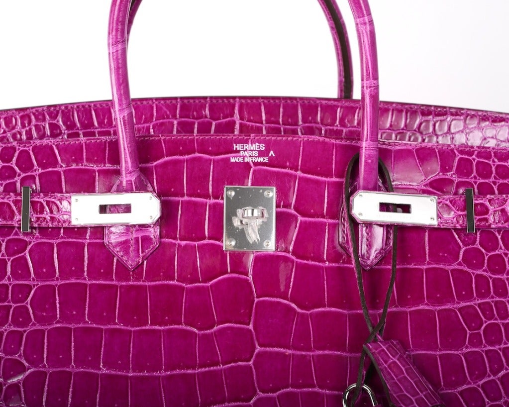 As always, another one of my fab finds! THIS COLOR WILL TAKE YOUR BREATH AWAY! Hermes Birkin bag 40cm in porosus crocodile. Very rare FIND in the new ROSE SCHEHERAZADE color. Comes with the original box and all the accessories. The bag has gorgeous