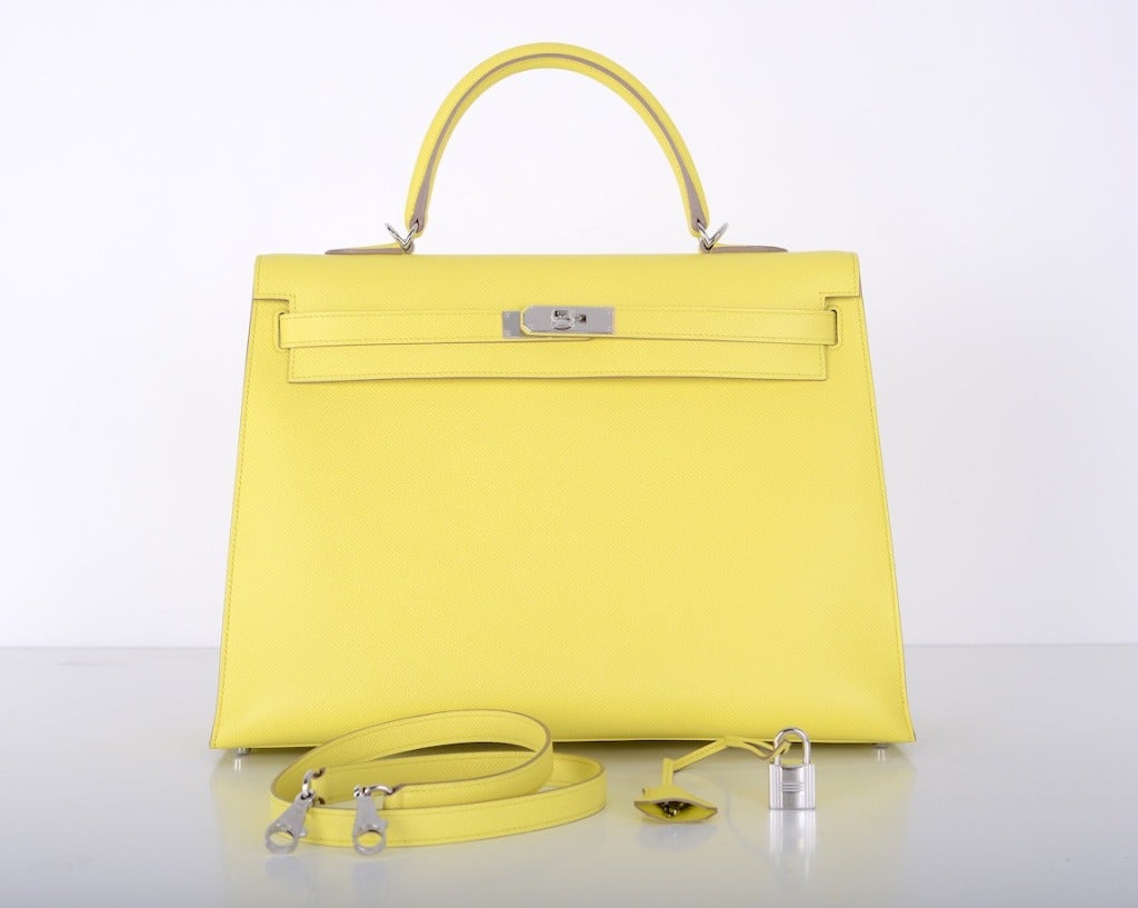 As always, another one of my fab finds! VERY SPECIAL NEW YELLOW COLOR! Hermes KELLY BAG 35cm SOUFRE in epsom leather. The hardware is palladium.
Beautiful new lime color!

This bag is brand new comes with everything: box, raincoat, sleeper and