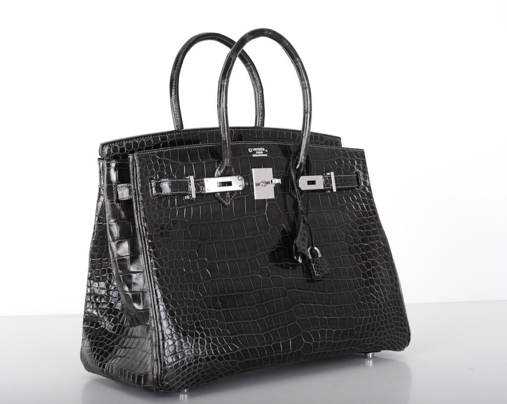 HERMES BIRKIN 35CM IN THE MOST BEAUTIFUL SPECIAL ORDER POROSUS GRAPHITE WITH ARDOISE CHEVRE INTERIOR.
THE HARDWARE IS PALLADIUM.

This bag was a special order in two colors. 

THE ULTIMATE BAG TO OWN! MAKE A STATEMENT WITHOUT SAYING A WORD...