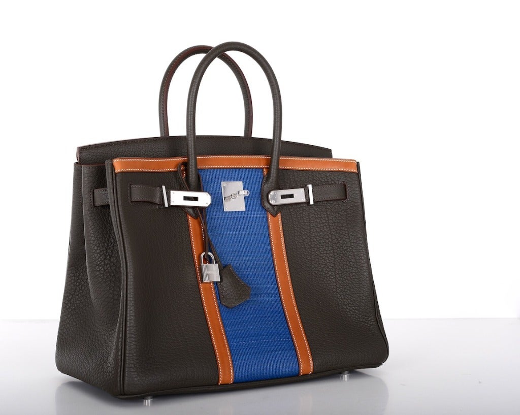 As always, another one of my fab finds! Hermes 35cm Birkin in the most stunning TRI COLOR COMBINATION CLUB VERT BRONZE FJORD LEATHER with BLEU THALASSA in the MIDDLE & a gorgeous BARANIA STRIPE. THIS BAG IS A BREATHTAKING COMBINATION! BE THE ONLY