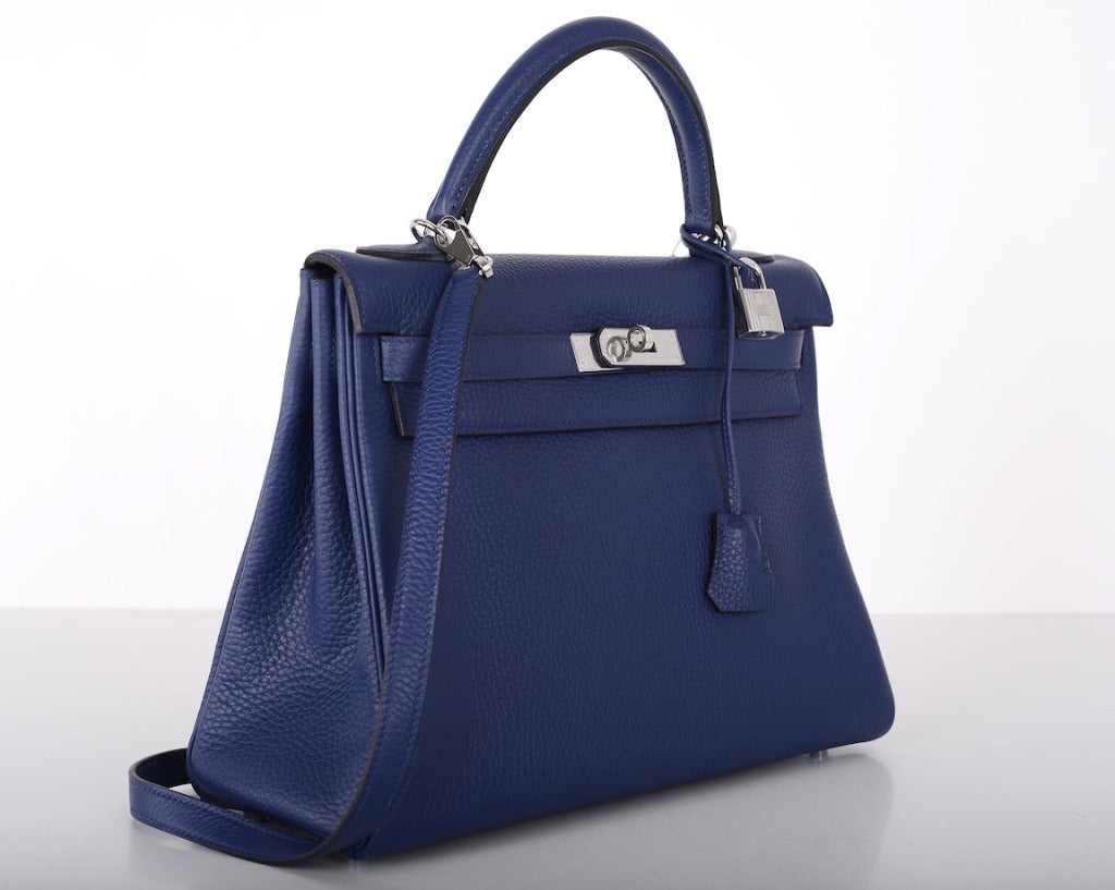 As always, another one of my fab finds! Hermes KELLY 32cm. NEW INCREDIBLE SAPPHIRE COLOR WITH PALLADIUM HARDWARE!

This bag is brand new with original box and accessories.
