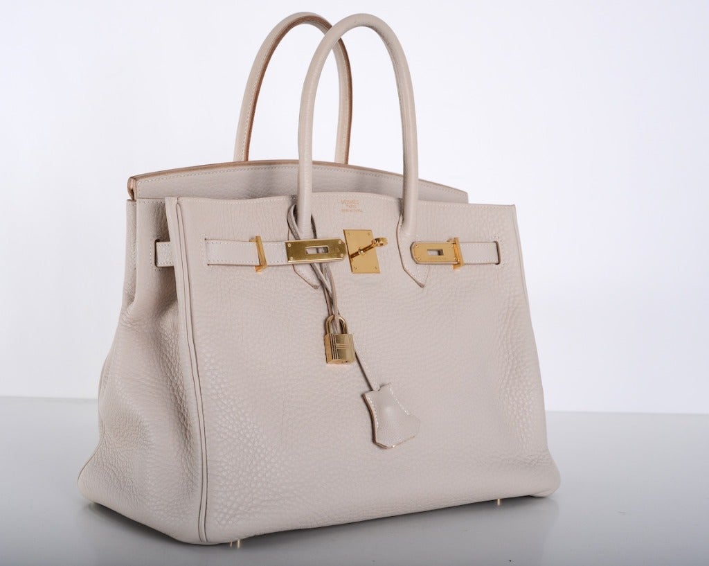 As always, another one of my fab finds! SUPER rare color Hermes BIRKIN BAG 35cm beige in beautiful clemence leather with GOLD hardware!

This bag is in excellent condition. The bag was used. The plastic was taken off the hardware - please view all
