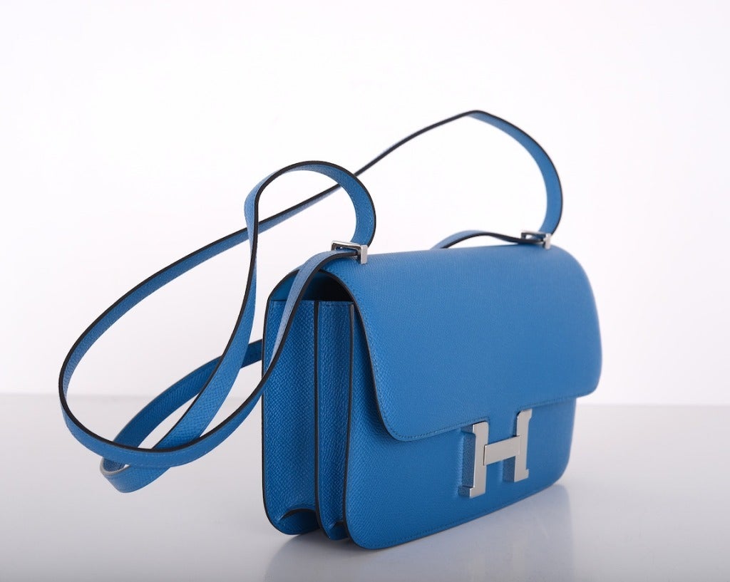 As always, another one of my fab finds! Hermes new Constance Elan 25cm. BLUE IZMIR COLOR!  Comfy longer strap that is perfect on the shoulder and cross body wear!

Beautiful EPSOM leather! Palladium hardware!

This bag is brand new with original