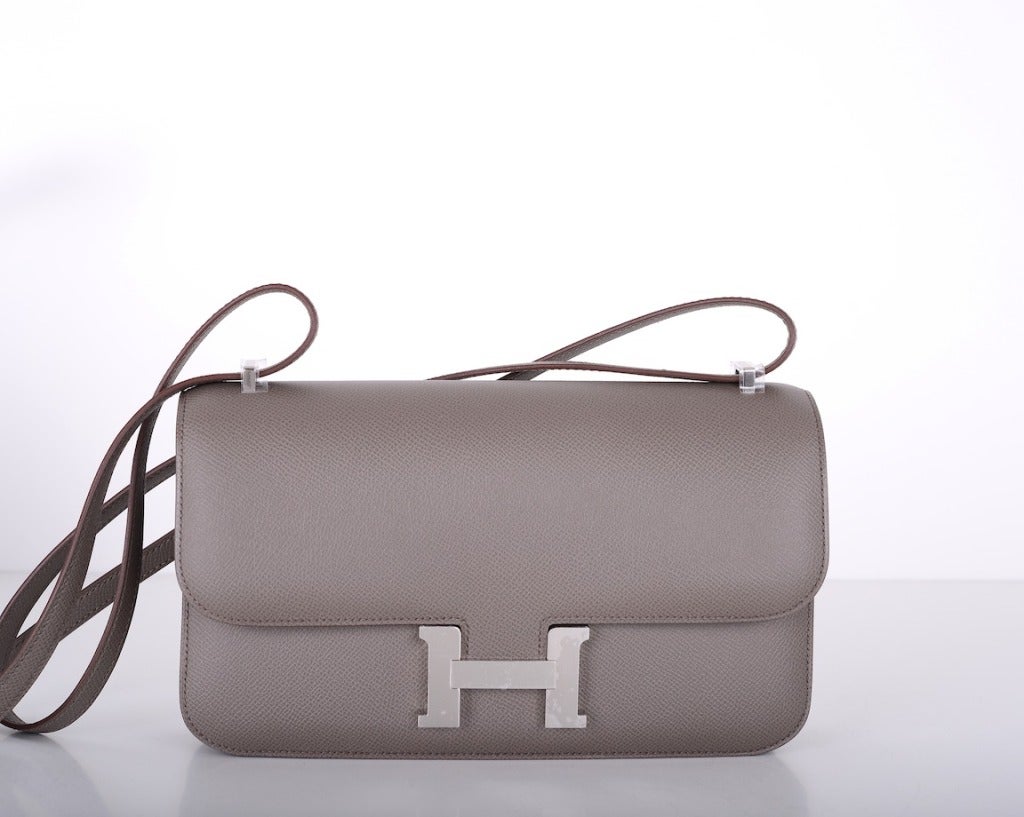 As always, another one of my fab finds! Hermes new Constance Elan 25cm. Etain COLOR! Comfy longer strap that is perfect on the shoulder and cross body wear!

Beautiful  EPSOM leather palladium hardware!

This bag is brand new with original box