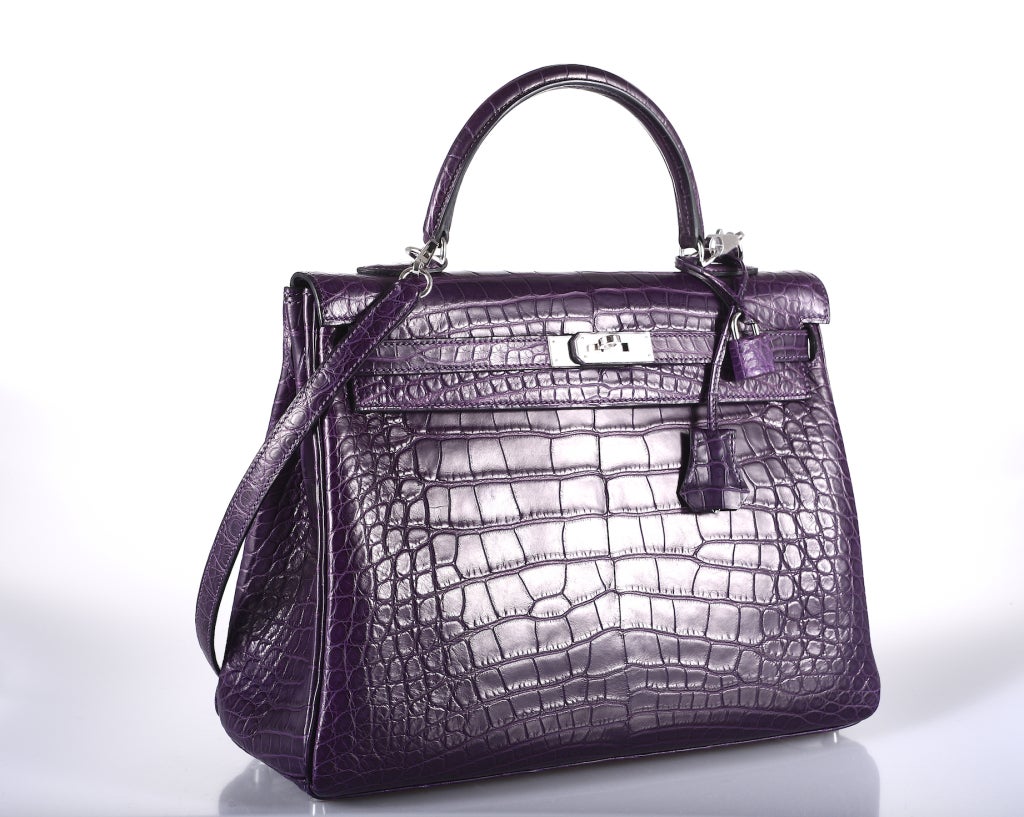 SUPER GORGEOUS NEW JEWEL COLOR AMETHYST! HERMES KELLY 35CM IN THE MOST BEAUTIFUL SPECIAL MATTE ALLIGATOR. THE HARDWARE IS PALLADIUM!

THIS BAG IS BRAND NEW STAMP R. THE RICHEST AMETHYST I HAVE EVER SEEN!

THE ULTIMATE BAG TO OWN! Make a