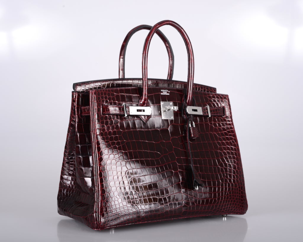 HERMES BIRKIN 35cm IN THE MOST BEAUTIFUL POROSUS CROCODILE. STUNNING COMBINATION! SHINY BORDEAUX. THE HARDWARE IS PALLADIUM! GO AHEAD TREAT YOURSELF! 

THE ULTIMATE BAG TO OWN! MAKE A STATEMENT WITHOUT SAYING A WORD!

THE BAG COMES WITH BOX,