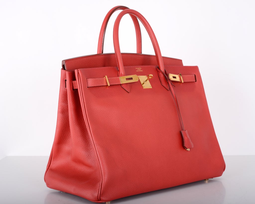 As always, another one of my fab finds! Hermes 40cm BIRKIN BAG in beautiful RED WITH GOLD hardware.
SUPER RARE ARDENNE LEATHER with SO HARD TO FIND GOLD HARDWARE!
CLASSIC, GORGEOUS, FOREVER A STAPLE!

This bag comes with lock, keys, and