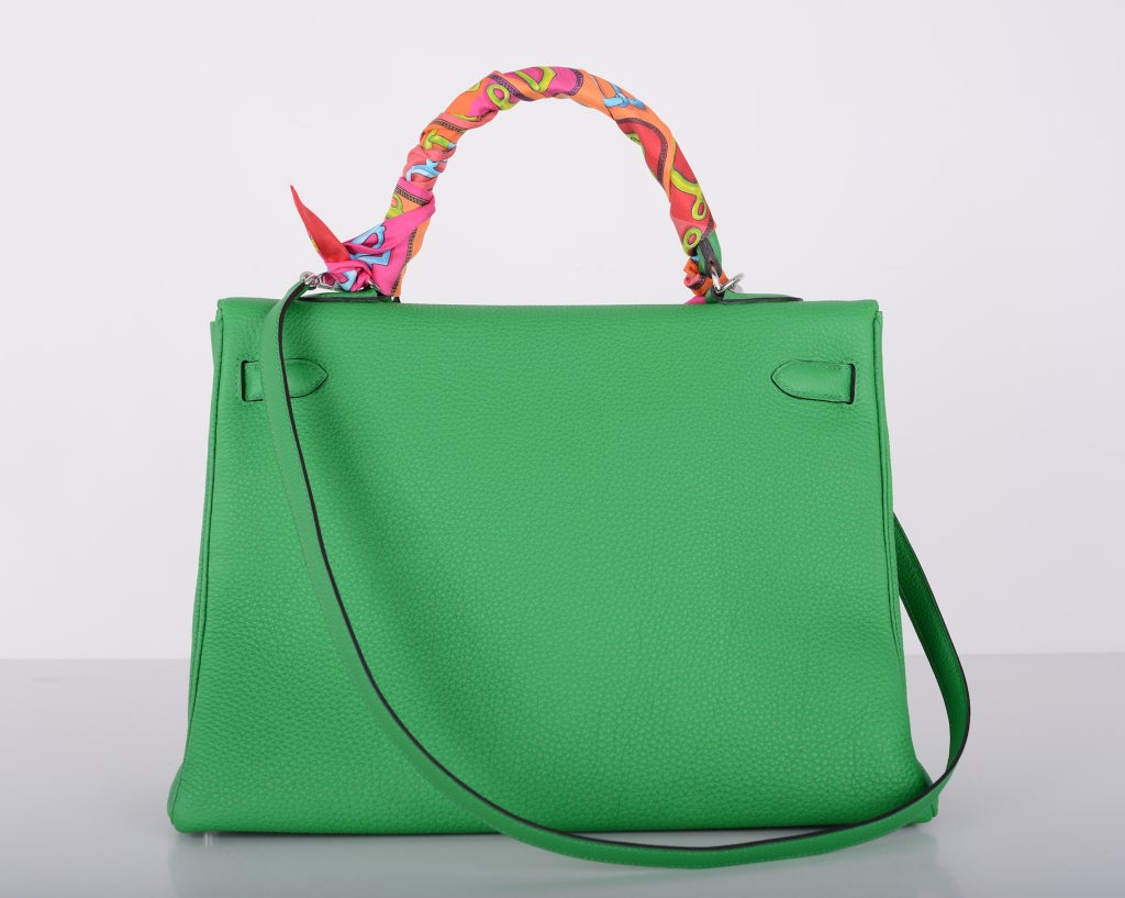 As always, another one of my fab finds! BAMBOU! INCREDIBLE NEW GREEN Hermes BIRKIN BAG 35cm with Palladium hardware. TOGO leather.
THIS NEW COLOR IS REALLY IS FANTASTIC!  
This bag comes with lock, keys, clochette, a sleeper for the bag, rain