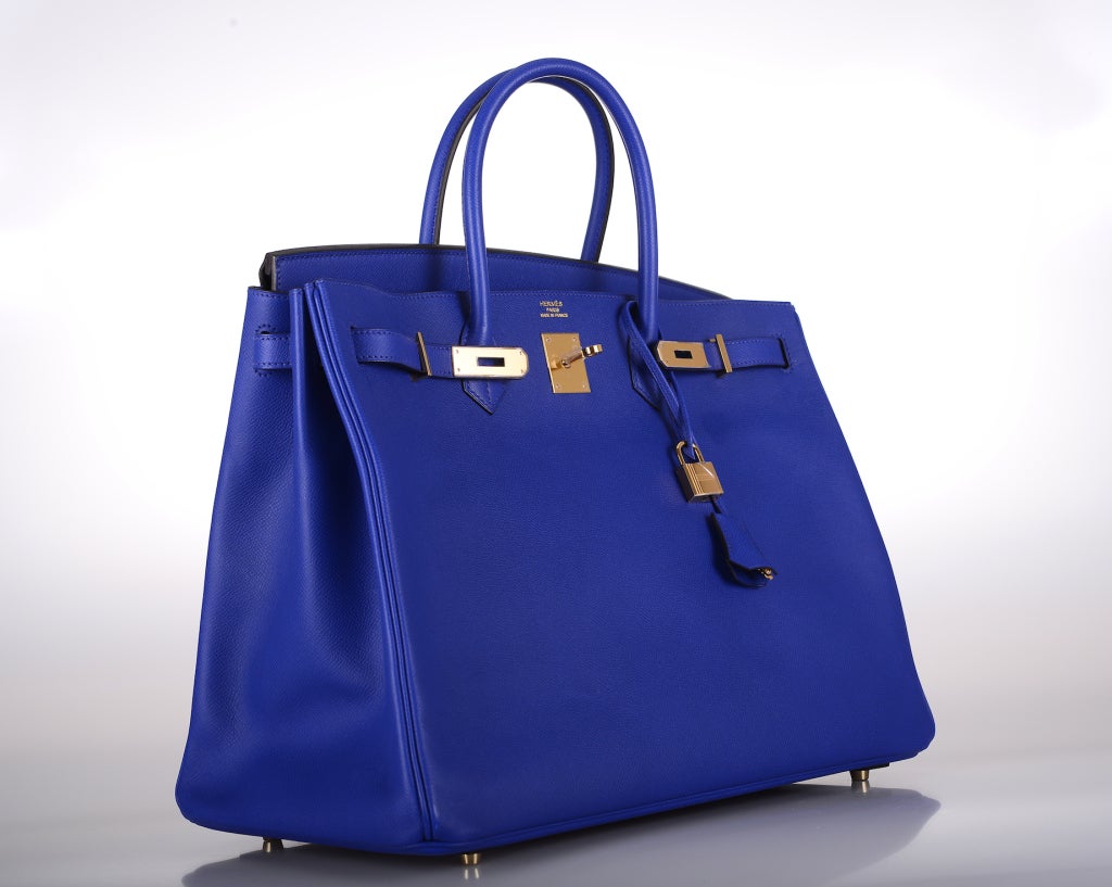 As always, another one of my fab finds! Hermes 40cm NEW COLOR BLUE ELECTRIC BIRKIN IN EPSOM LEATHER WITH UN-GET-ABLE GOLD HARDWARE!
THIS BAG WILL TAKE YOUR BREATH AWAY! TRULY A MASTER PIECE!

This bag comes with lock, keys, clochette, a sleeper