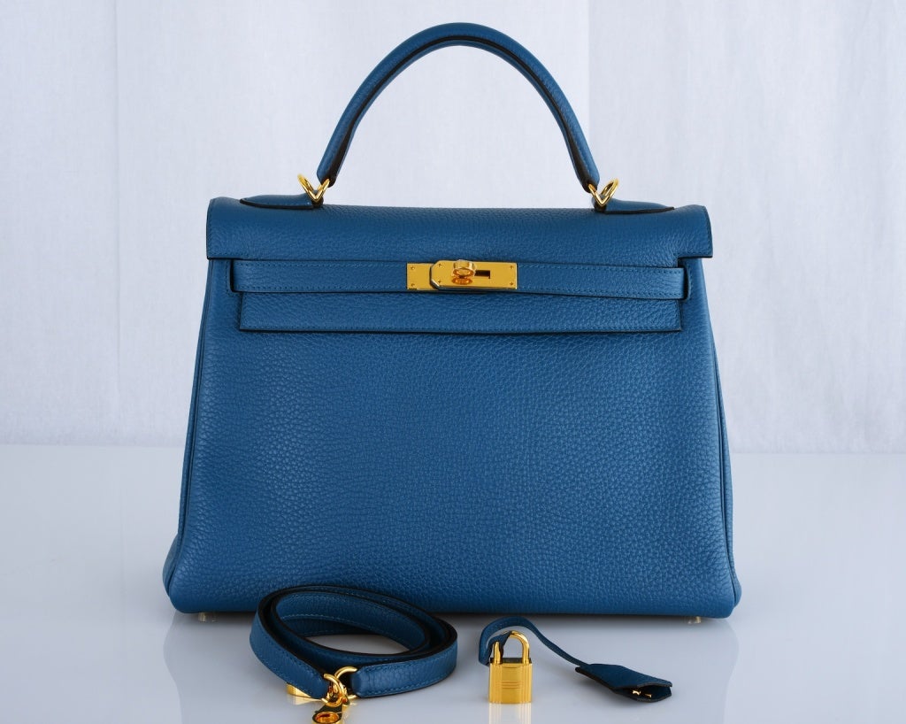 HERMES KELLY 32CM BAG THALASSA BLUE TOGO GOLD HARDWARE AMAZING!

As always, another one of my fab finds, Hermes 32cm YEP THALASSA BLUE KELLY IN TOGO LEATHER & GOLD hardware. This bag is brand new with original box and accessories. THERE IS NO