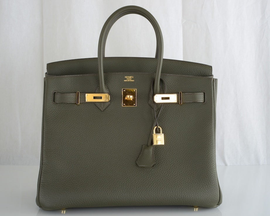 HERMES 35CM BIRKIN BAG VERT GRIS TOGO GOLD HARDWARE... Gorgeous

As always, another one of my fab finds, Hermes 35cm Birkin in beautiful GREY WITH OLIVE UNDERTONES Vert GRIS TOGO leather with BEAUTIFUL GOLD hardware — This bag comes with lock,