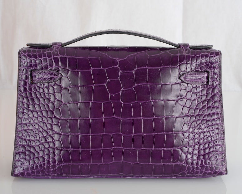HERMES KELLY BAG CLUTCH JPG POCHETTE AMETHYST ALLIGATOR CLUTCH U GOTTA C! 

As always, another one of my fab finds, Hermes Kelly Jpg pouchette in  stunning semi matte ALLIGATOR. The color is breathtaking impossible to get amethyst.The hardware is