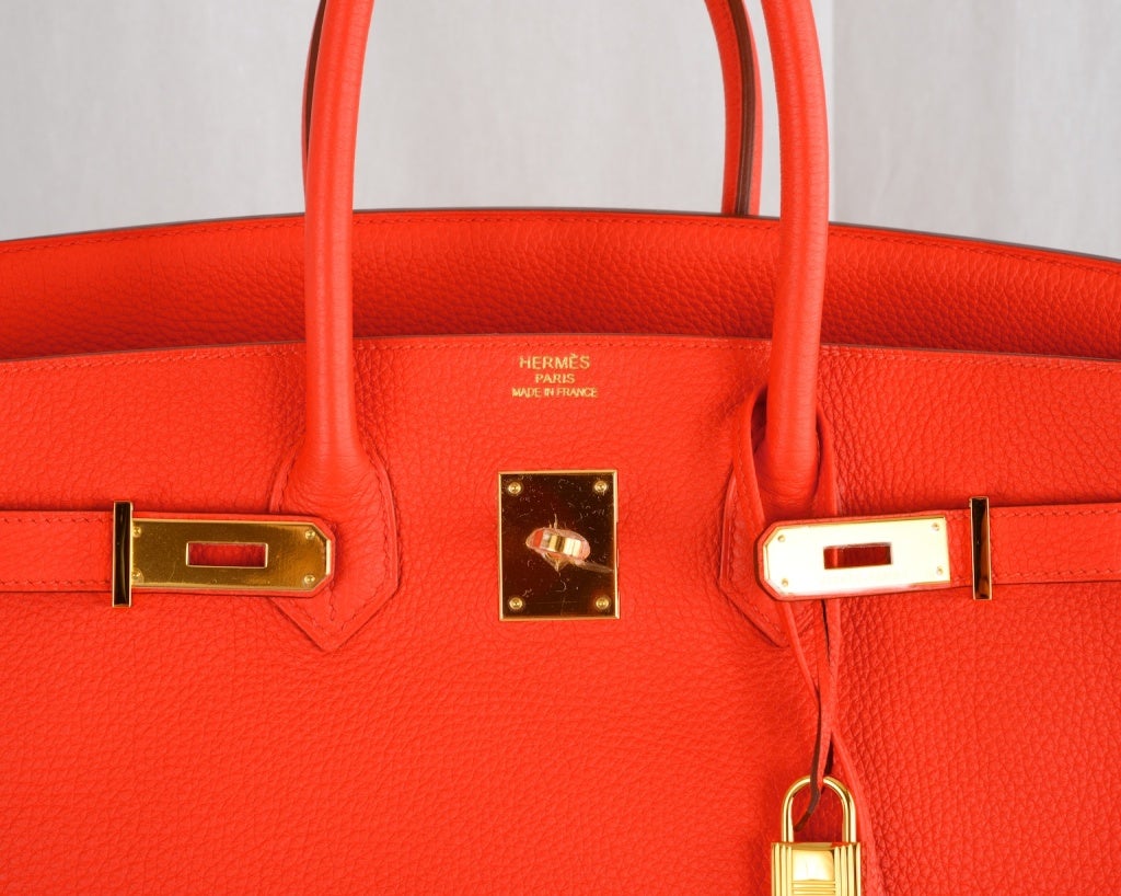 HERMES BIRKIN BAG 35CM CAPUCINE GOLD HARDWARE NEW COLOR!

As always, another one of my fab finds, Hermes 30cm Birkin in beautiful NEW color CAPUCINE  35CM, TOGO leather with GOLD HARDWARE.

• This bag comes with lock, keys, clochette, a sleeper