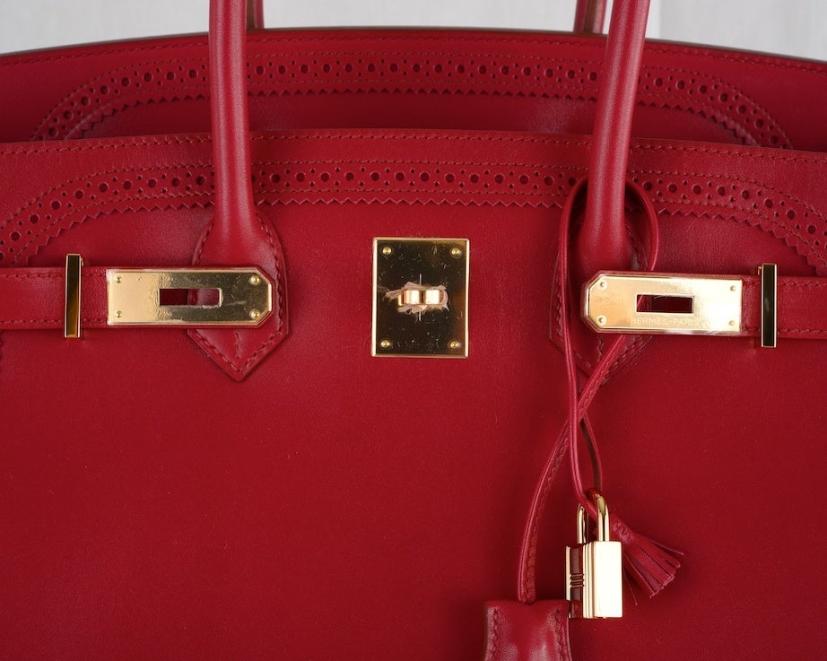 HERMES BIRKIN GHILLIES BAG RUBY RED WITH ROSE GOLD HARDWARE WOW!

As always, another one of my fab finds, NEW Hermes 35cm BIRKIN BAG GHILLIES INSPIRED BY THE SCOTTISH GHILLIE BROGUE SHOES. COLOR RUBY RED YOU WILL ABSOLUTELY ADORE THE WONDERFUL