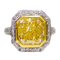 Vintage A Natural Canary 5.02 Carat Fancy Light Yellow  Diamond Ring.
