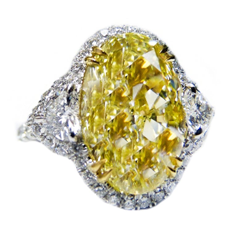 Absolutely Stunning 9.04 Carat Oval Shape Fancy Yellow Diamond