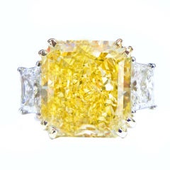 Flawless 11.60 Carat Fancy Intense Yellow Radiant cut Diamond Ri