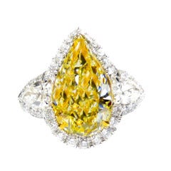 Passionate Fancy Yellow Pear Shaped GIA Cert 5.33 Carat Diamond Platinum Ring