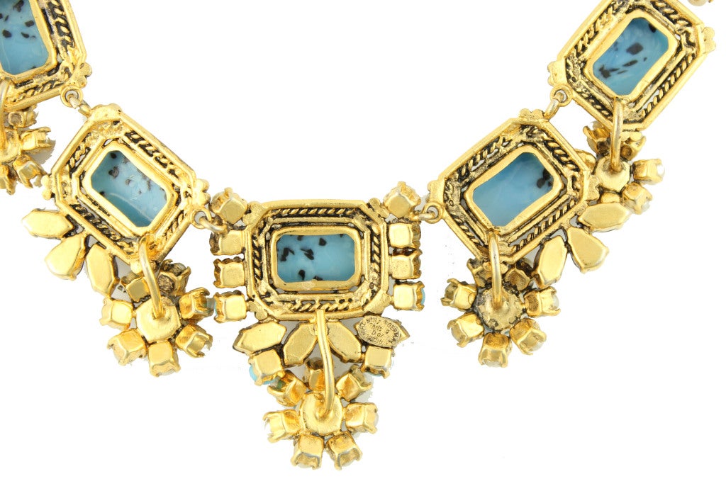 1964 Dior gold toned necklace with crackled turquoise stones surrounded by pearls, blue rhinestones, and turquoise cabochons
