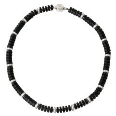 Garrard Onyx, Diamond 
White Gold Disc Necklace