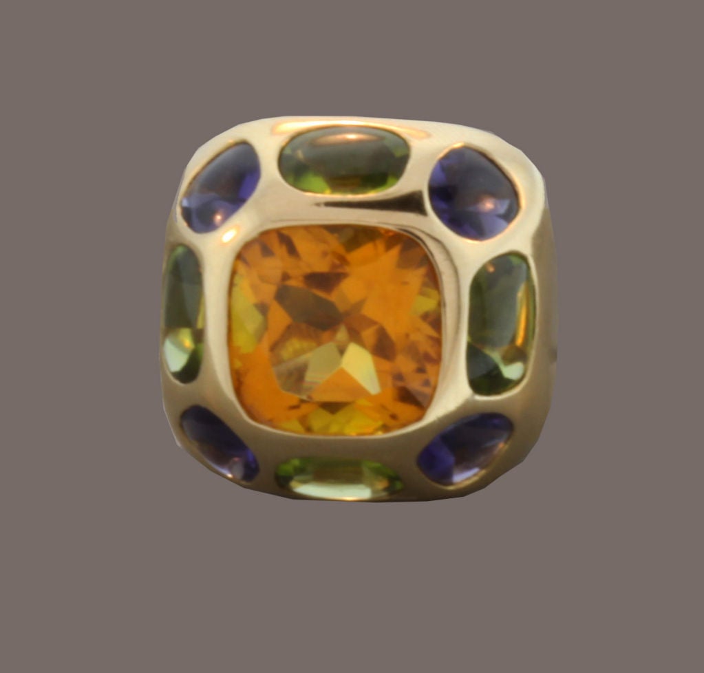Exquisite Chanel ring with Citrine, Iolite and Peridot in a 18K yellow gold dome. Signed Chanel #182661.