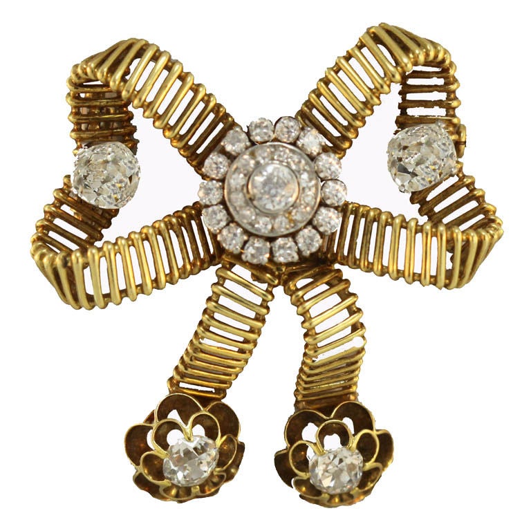 MELLERIO Stylized French  Diamond Bow Pin For Sale