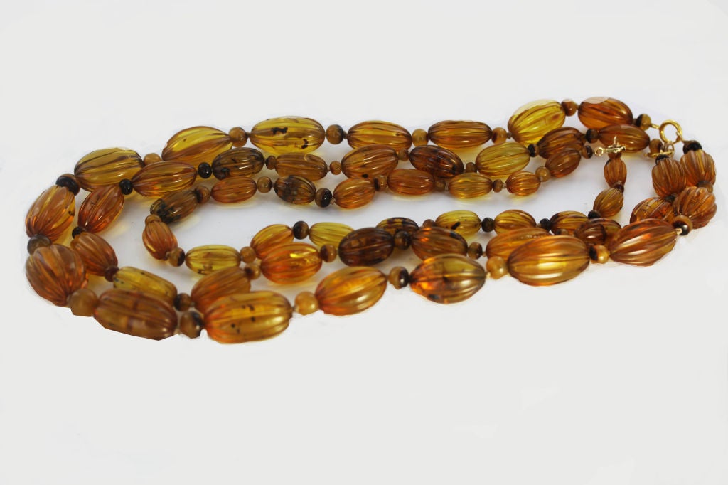 Three Natural Carved Amber Bead Necklaces