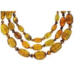 Three Natural Carved Amber Bead Necklaces