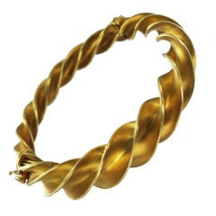 SCHLUMBERGER Brushed Gold Twist Bangle