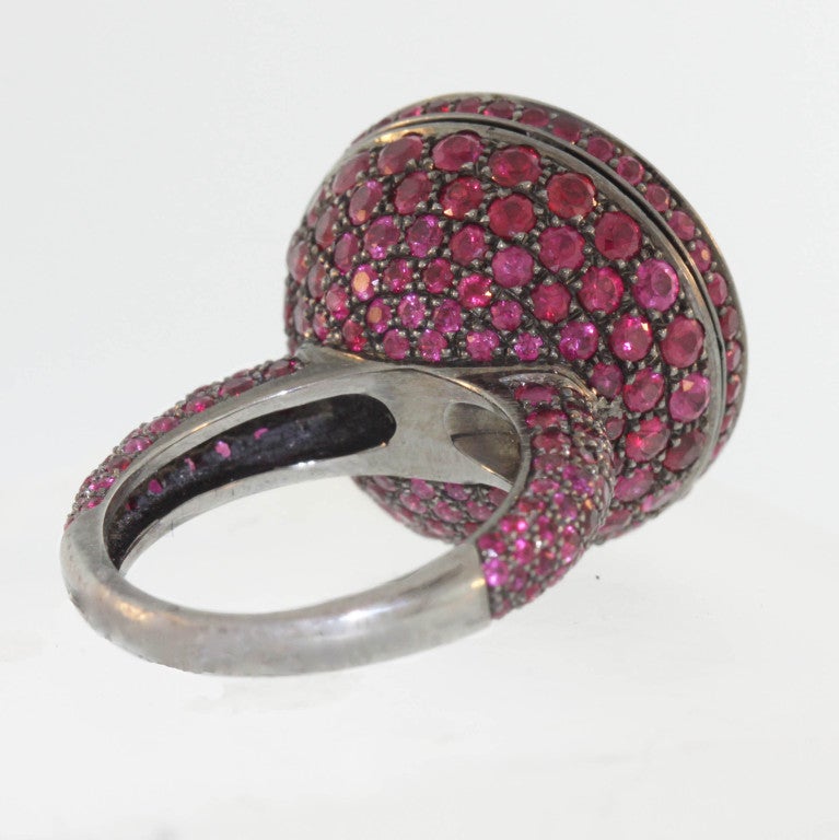 Contemporary BOUCHERON Blackened Gold and Ruby Secret Ring For Sale