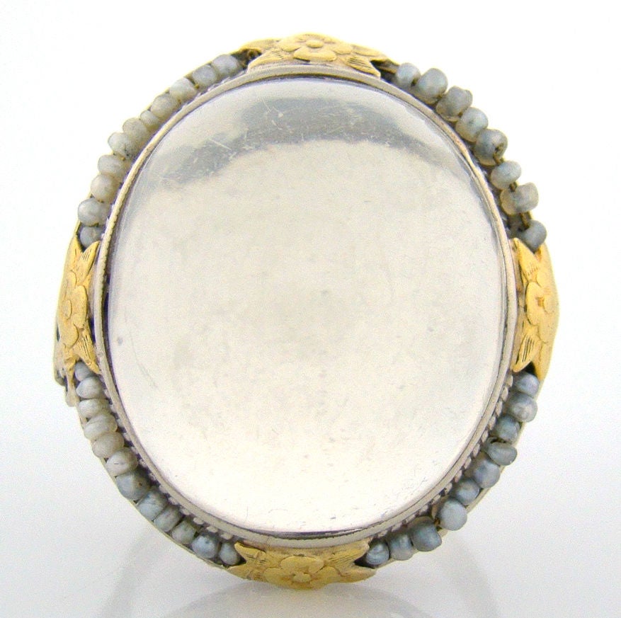 Pronounced, luminous, and rare moonstone for which this Victorian white and yellow gold ring was hand created. This type of Sri Lankan moonstone was mined heavily up until the turn of the century, by the likes of Tiffany & Co. for example, going