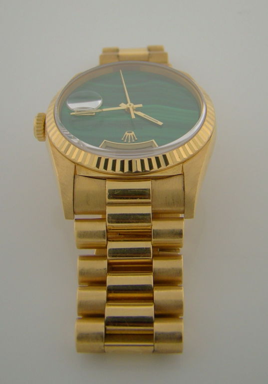 A very collectable Day Date with unique malachite dial. A double quick Day Date movement. 18K yellow gold case in excellent condition.