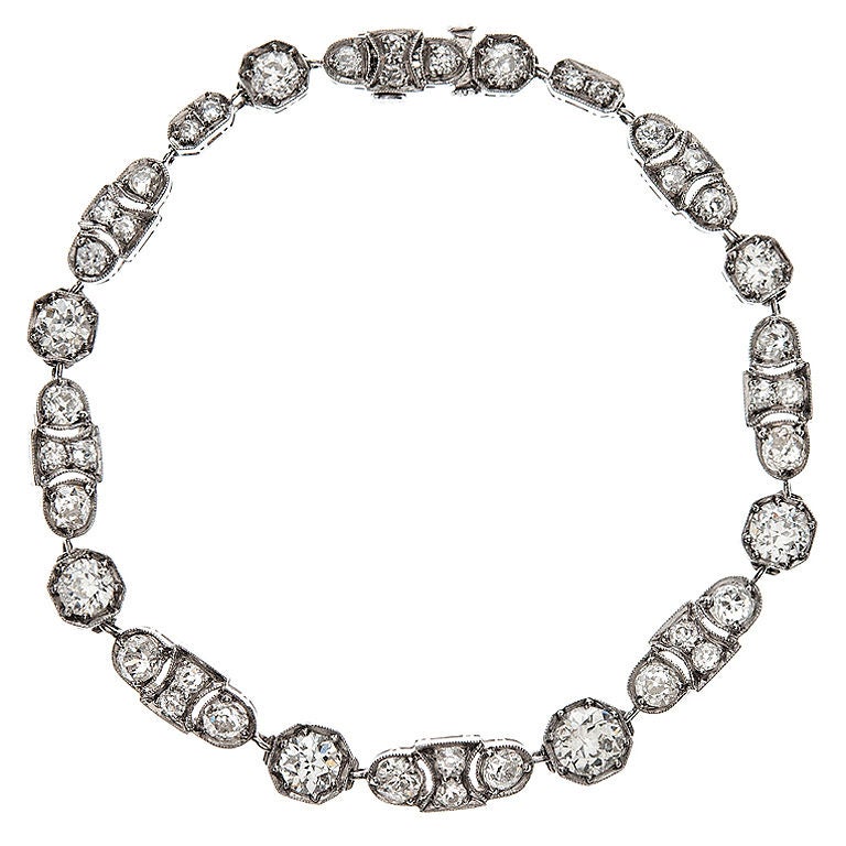 Art Deco Elegant Diamond and Platinum Unique Tennis Bracelet at 1stDibs