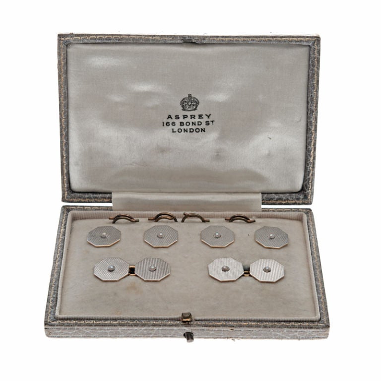 A rare antique tuxedo suite by Asprey of London made back in the 1920's. Understatedly elegant, these dress cufflinks and tuxedo suite remains both dressy and masculine. Possessing the perfect 