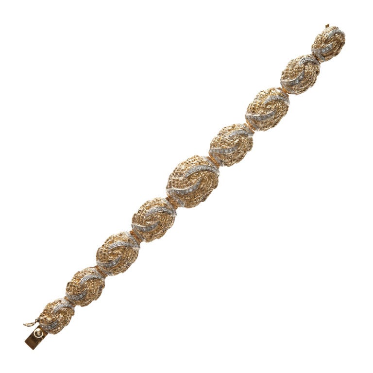 A very fine one of a kind bracelet by New York based Italian designer TOLIRO. This bracelet is as comfortable as it is eye catching. Crafted in 18 yellow gold, the golden domes are hand carved and designed to be lighter with a finely finished golden
