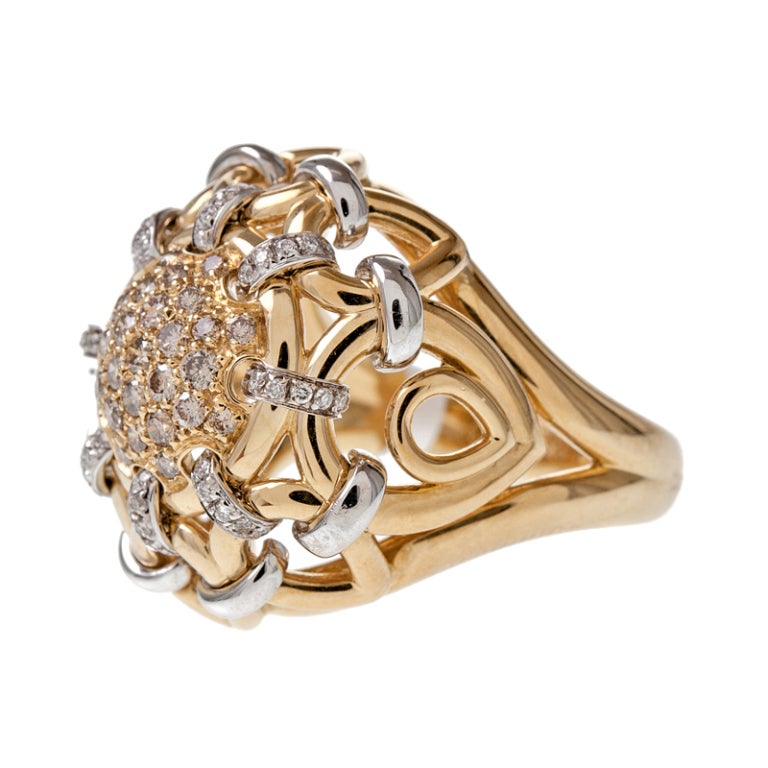 Made of 18k yellow gold ring with .73cttw diamonds, signed 
