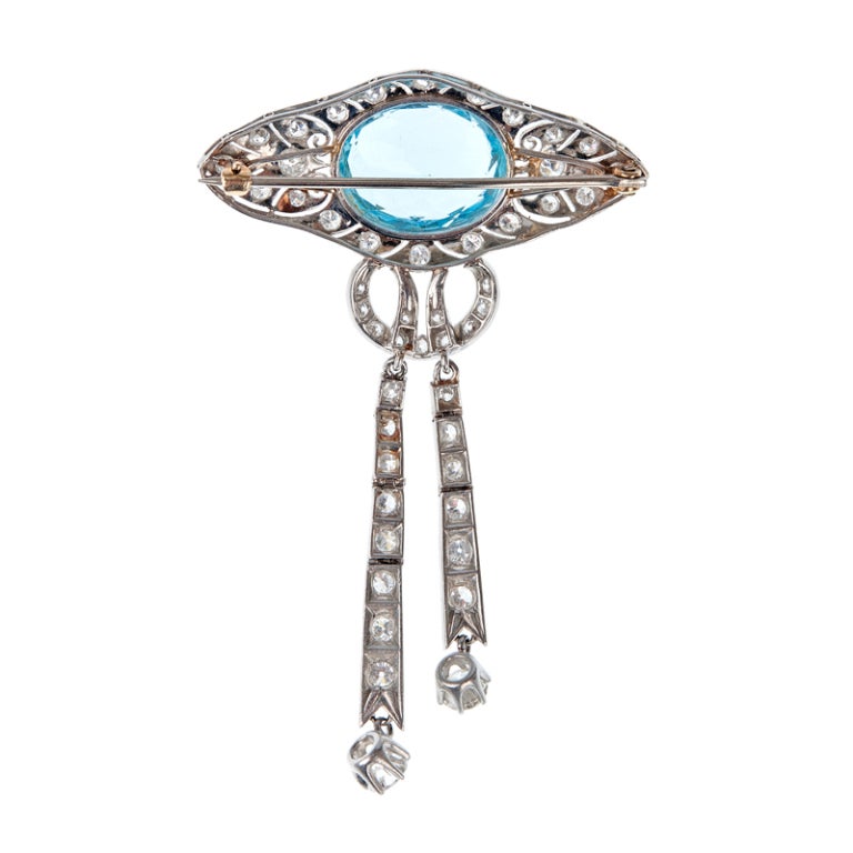 Outstanding example of original Art Deco design, the fine filigree detail and design beautifully showcase a large 10 carat oval faceted aquamarine in it's center.