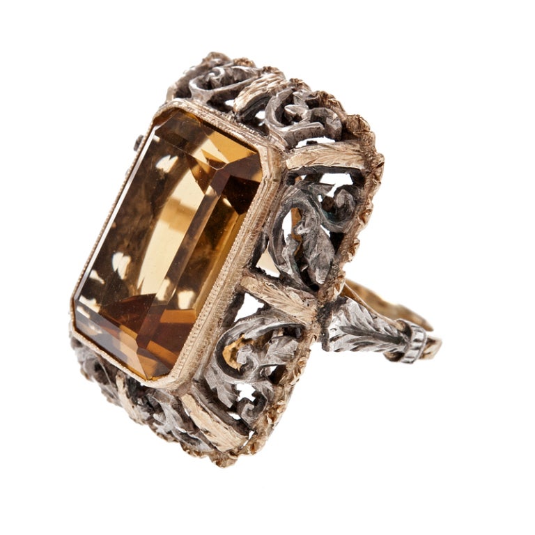 Antique Edwardian Citrine Silver over Yellow Gold Handmade Ring.  The yellow gold bezel surrounds a beautifully colored citrine which weighs approximately 7 -1/2 t 8 carats.