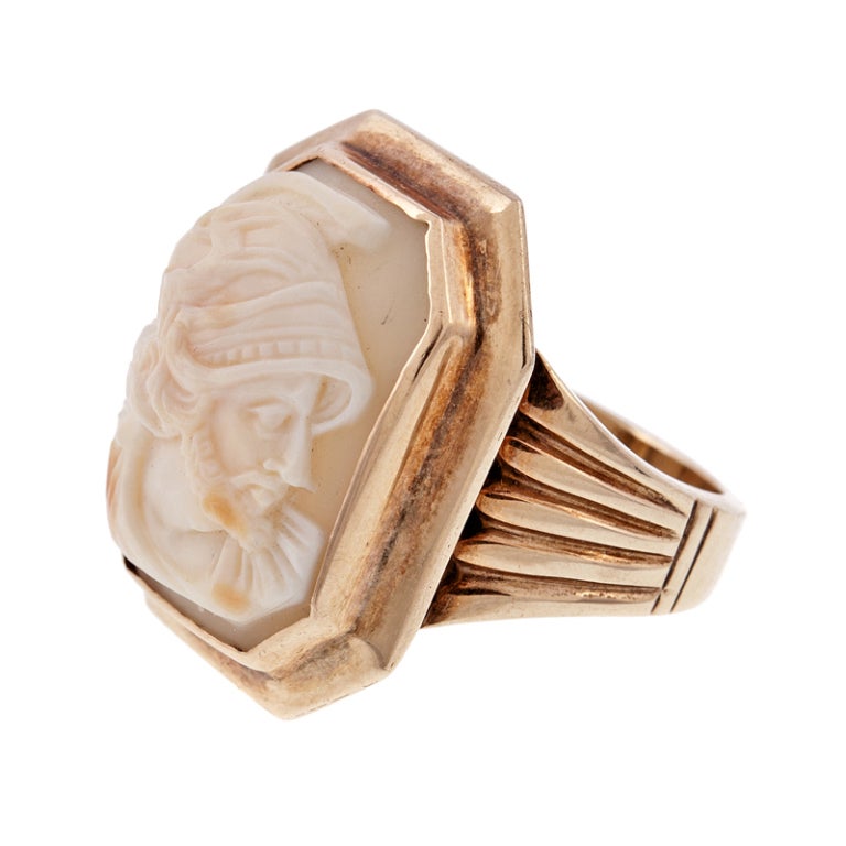 A fine depiction is carved into this gentleman's antique ring. One can see the fantastic detail in this carving, such as the 